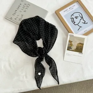 Black polka dot skinny silk scarf, elegant floral neckerchief for women's stylish wear.