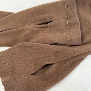 Brown thumbhole sleeve cuff detail, soft ribbed knit fabric, comfortable everyday wear essential