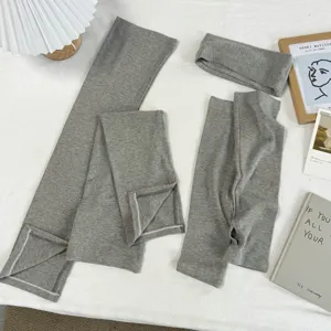 Grey knit 3-piece set featuring sleeves, headband, and leg warmers for versatile daily wear.