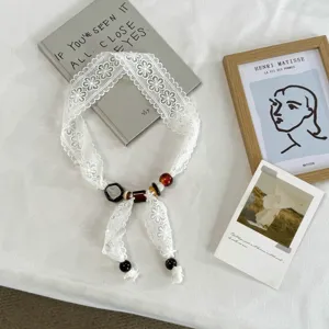 White lace ribbon necklace choker scarf for women spring summer fashion accessory detail