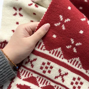 Christmas jacquard knit scarf detail view, soft cozy winter wool neck warmer for women.