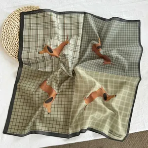 Close-up detail of vintage plaid square scarf featuring cute dachshund print, 100% cotton.