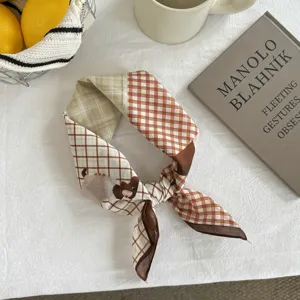 Detailed view of a Japanese retro plaid cartoon puppy cotton square scarf, elegant neck accessory.