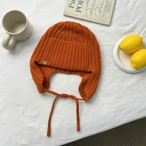 Gorro de punto de pura lana naranja mujer otoño invierno gorro de bombardero con orejeras