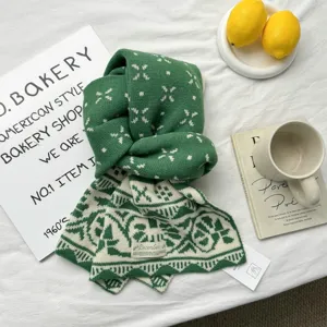 Green Christmas jacquard knitted winter warm scarf, cozy soft holiday fashion accessory.