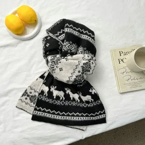 Winter knitted scarf with elk pattern, thick warm wool scarf, cozy holiday fashion accessory.