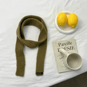Solid color olive green knitted narrow scarf, cozy autumn winter warm fashion accessory.