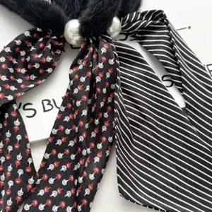 Plush faux fur neckerchief with pearls and striped pattern, chic winter warm scarf accessory.
