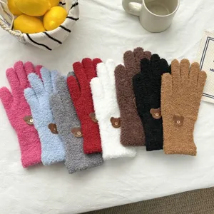 Cute fluffy plush winter gloves for women, warm thick split-finger cold-weather mittens with bear patch.