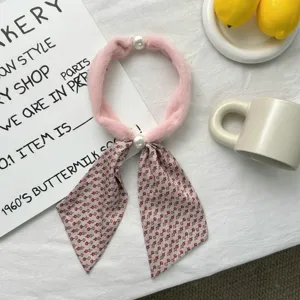 Pink plush scarf with magnetic buckle pearl decor and chic printed ribbon, soft style.