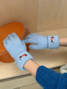 Light blue knitted touchscreen gloves for women, warm winter five-finger gloves with cute dog embroidery.