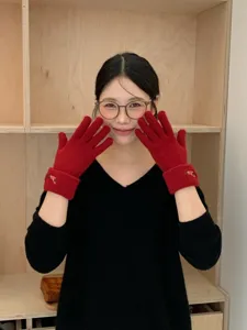 Women winter warm knitted touch screen gloves featuring cute puppy embroidery detail.