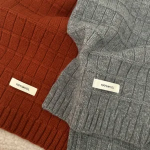 Cozy 100% wool knit scarf in rust and grey, soft solid color winter warm neck accessory.
