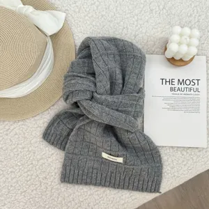 Cozy gray 100% wool knitted plaid scarf detail view, soft warm winter neckwear accessory.