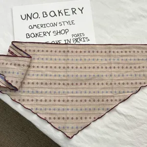 Retro cotton print triangle scarf, versatile hair band and stylish clothing accessory item.