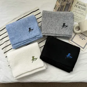 Cozy solid color knitted winter scarf for women and men, soft warm neck warmer fashion.