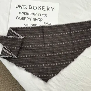 Retro cotton triangular scarf detail shot, showing vintage patterned bandana design for women.