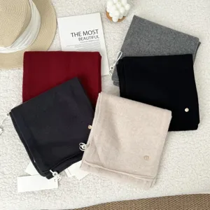 Classic winter knitted wool scarf for women, thickened warm neck protection, multiple colors.