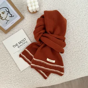 Cozy winter warm 100% wool scarf in rich caramel brown color, soft and vintage style.
