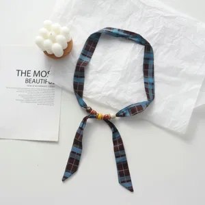 Blue plaid fabric ribbon necklace with wooden beads, stylish choker sweater accessory.