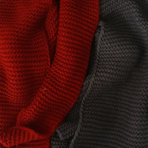 Gedetailleerde gebreide stoftextuur met fijn vakmanschap en zacht warm materiaal voor dames.