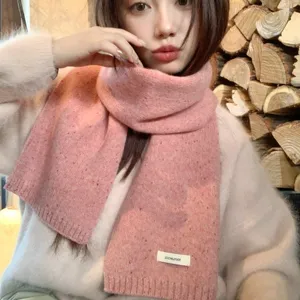 Cozy pink speckled knit wool scarf for women winter warmth, soft and stylish everyday accessory.