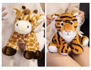 Cute plush giraffe and tiger stuffed animal toys detail view, soft fabric and cuddly design.