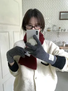 Knit touchscreen gloves for women, warm winter split finger gloves with stylish color block design.