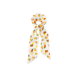 Pañuelo estrecho de gasa con estampado de cítricos y cinta para el pelo elegante accesorio de mujer.