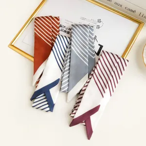 Elegant narrow striped silk scarf set, versatile long ribbon for bags and neckwear.