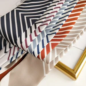 Chic striped narrow silk scarf for women, fashionable chevron neck ribbon and bag accessory.