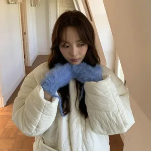 Cozy blue fuzzy winter gloves and arm warmers detail view, soft plush material style.