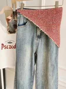 Korean fashion style denim pants with red checkered knit waist wrap asymmetric cool girl streetwear.