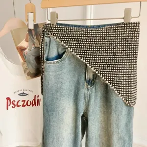 Fashion knit triangular waist scarf denim pants layering streetwear chic styling accessory.
