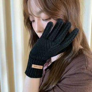 Women winter warm black knitted gloves, soft wool split finger touch screen thermal gloves.