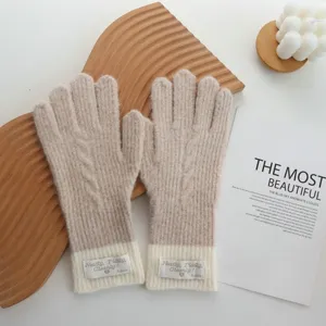 Cozy color-block knit gloves for women, stylish winter warm thermal hand wear accessories.