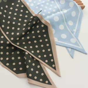 Chic polka dot skinny silk scarf for women, elegant long neck scarf for daily wear and suit styling.
