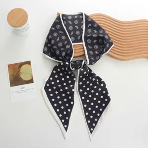Elegant black white twilly silk scarf with polka dot and paisley prints for women styling.