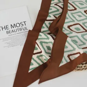 Fashion geometric print imitation silk triangular scarf, versatile elegant accessory for women.