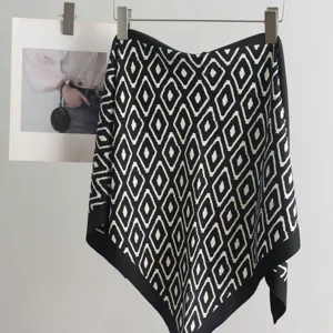 Minimalist black and white diamond print silk feel triangle scarf, elegant neckwear accessory.