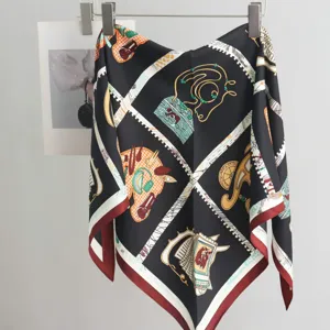 Detailed view of black twill silk scarf featuring vintage equestrian print and elegant borders.