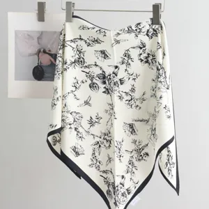 Elegant black and white floral print silk scarf triangle wrap fashion accessory for women.