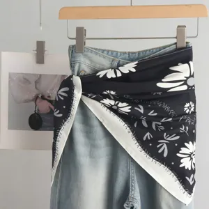 Women layered triangle scarf waist accessory with denim jeans, stylish chic 2025 new.