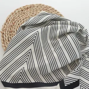 Black and white striped silk scarf detail, elegant geometric pattern twill scarf.