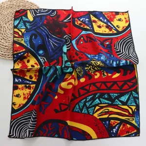 Detailed shot of a colorful abstract geometric printed silk square scarf, artistic scarf accessory.
