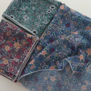 Floral cotton linen small square scarf detail view, soft breathable decorative neckerchief.