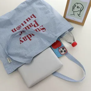 Segeltuch Tragetasche für Damen mit blau-weißen Streifen, große Kapazität modische lässige Schultertasche.