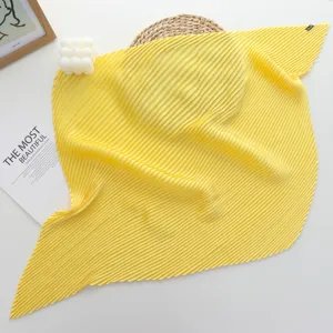 Yellow pleated square scarf for women, stylish imitation silk neckerchief accessory.