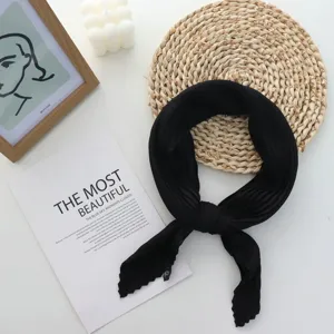 Black pleated square scarf for women, elegant silk-like neckerchief detail and stylish design.