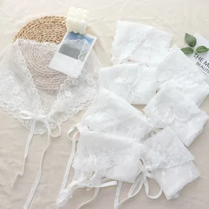 White lace layered triangle scarf and collar detail with floral style for summer outfits.